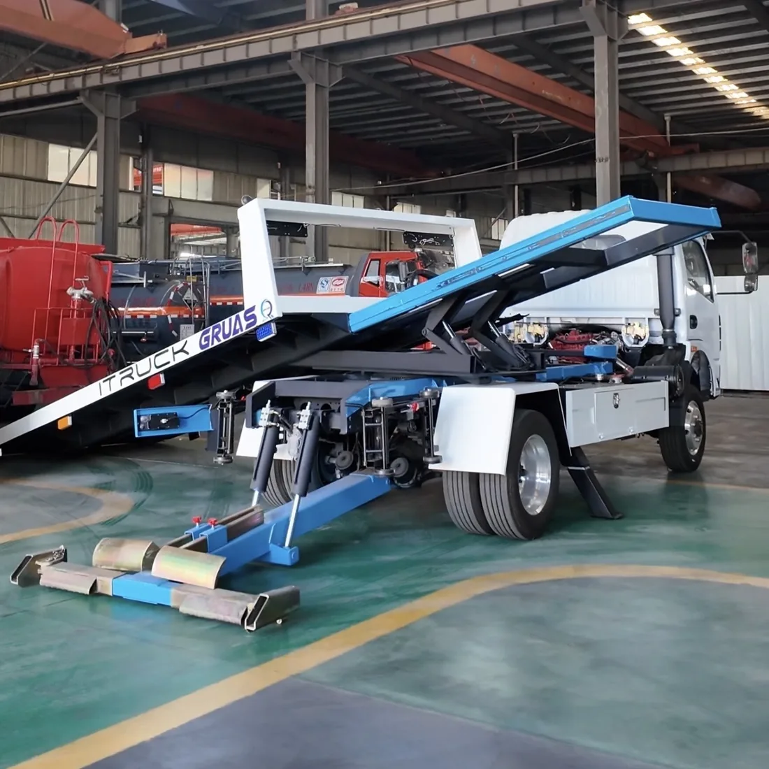 Rotating deck flatbed carrier