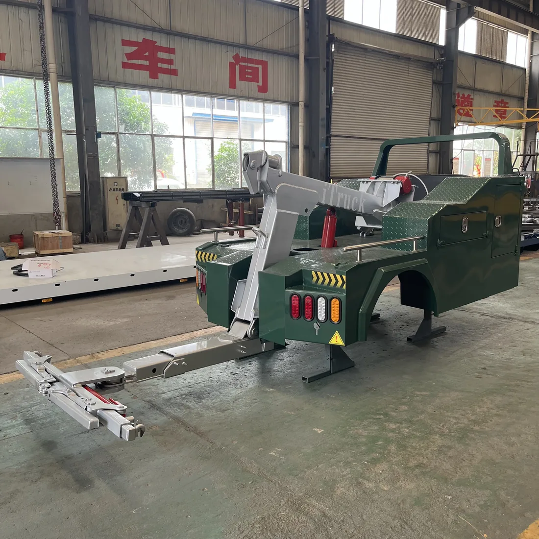 3-ton integrated wrecker body with underlift and tow bar extended